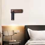 Event Horizon Adjustable Wall Sconce in Black Travertine and Brass