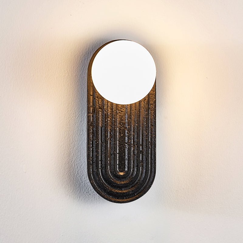 Eventide Orb Wall Sconce in Black Travertine with Opal Glass Globe