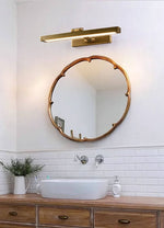 Everett Brass Swing Arm Wall Sconce for Modern Interiors