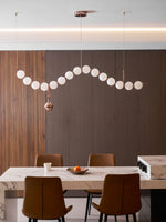 Ezrah Modern Linear LED Pendant Light – Frosted Glass Orbs