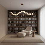 Ezrah Modern Linear LED Pendant Light – Frosted Glass Orbs