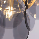 Velora Amber Disc Chandelier – Four-Tier Modern Art Deco Pendant Light
