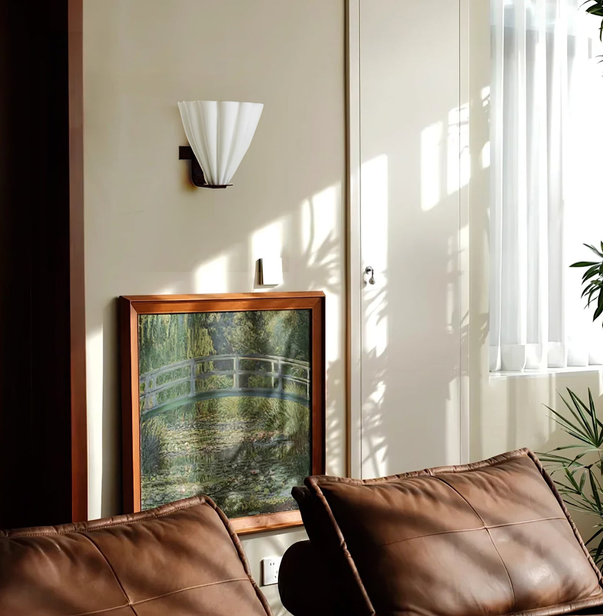 Fan-Shaped Glass Wall Sconce with Black Metal Accent
