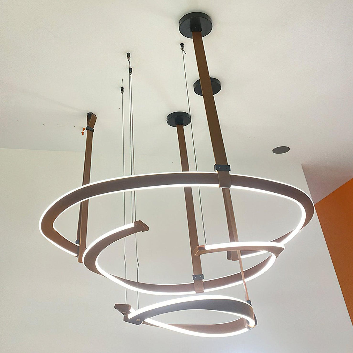 Finopi Linear LED Chandelier with Twisted Metal Rings and Leather Accents
