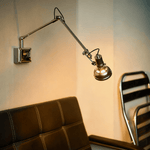 Flex Arm Wall Sconce with Adjustable Metal Shade for Modern Interiors