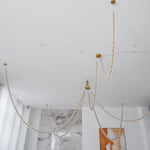 Gabriel Gold Crystal Chandelier – Sculptural LED Pendant for Modern Interiors