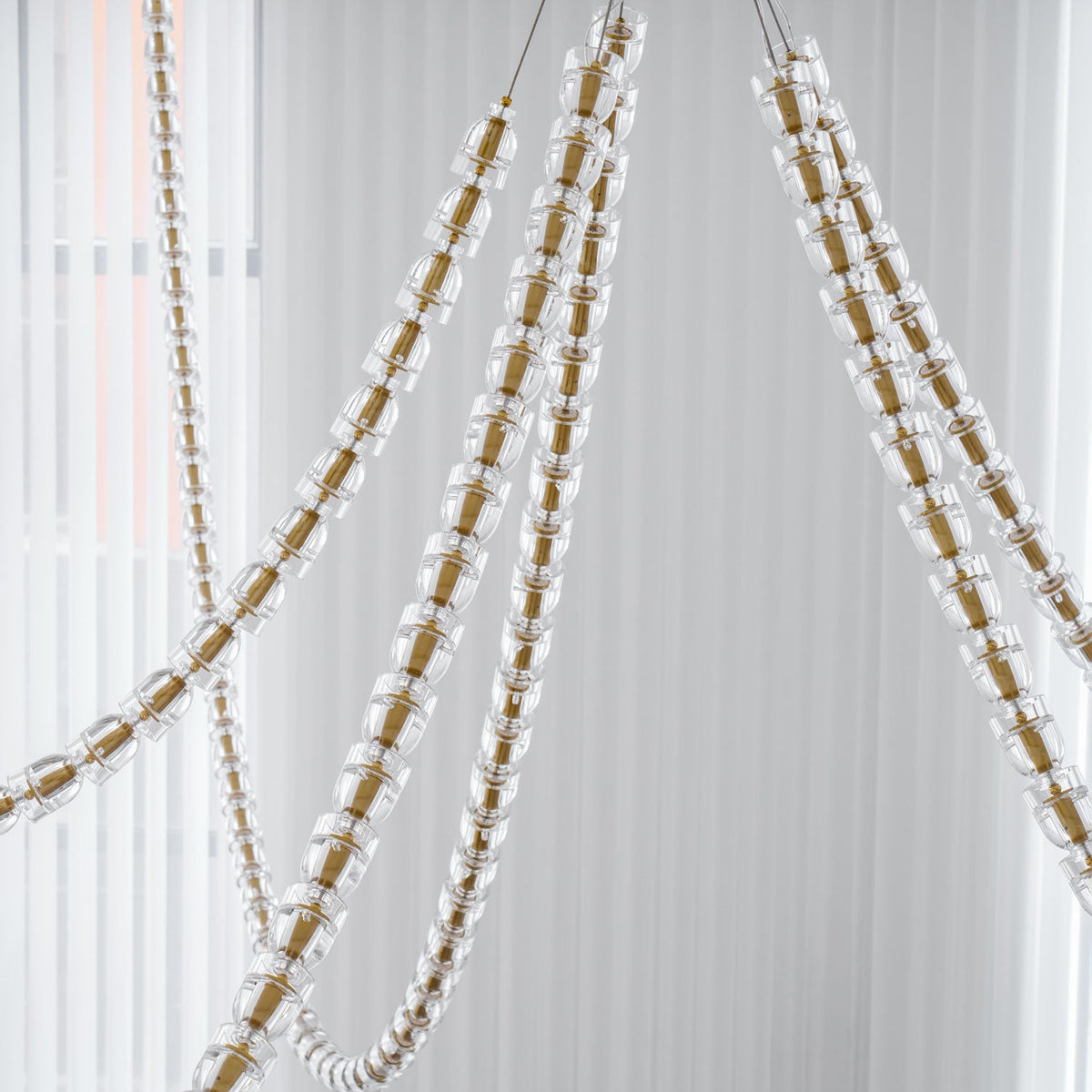Gabriel Gold Crystal Chandelier – Sculptural LED Pendant for Modern Interiors