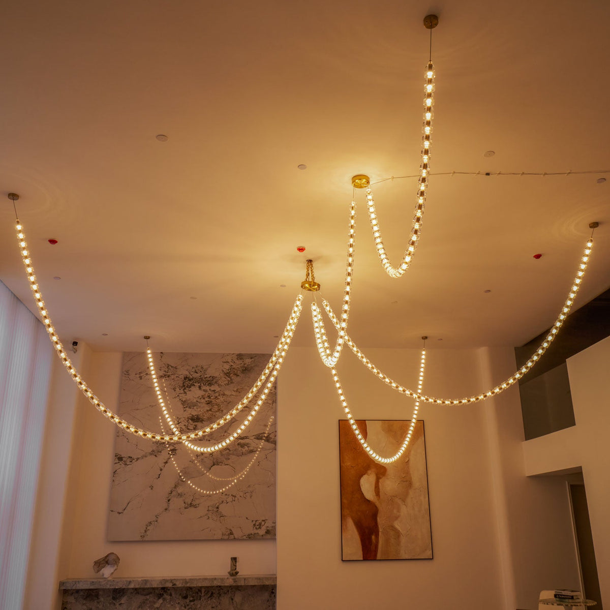 Gabriel Gold Crystal Chandelier – Sculptural LED Pendant for Modern Interiors
