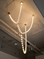Gabriel Gold Crystal Chandelier – Sculptural LED Pendant for Modern Interiors