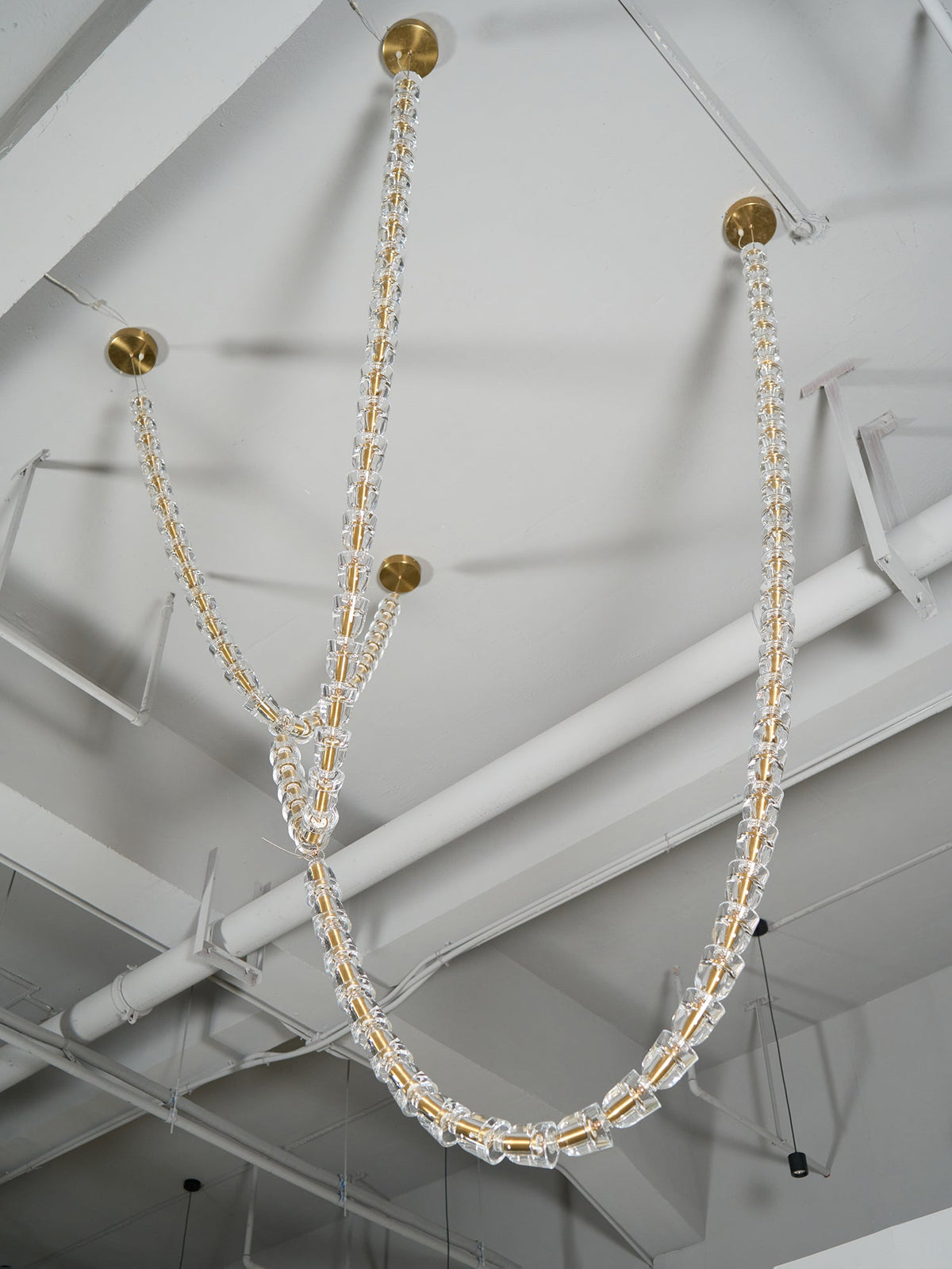 Gabriel Gold Crystal Chandelier – Sculptural LED Pendant for Modern Interiors