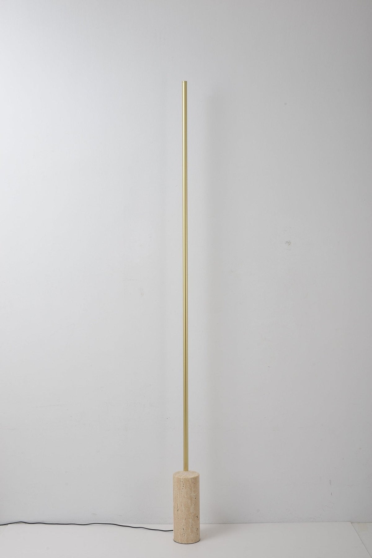 Linear LED Floor Lamp with Travertine Base for Modern Interiors