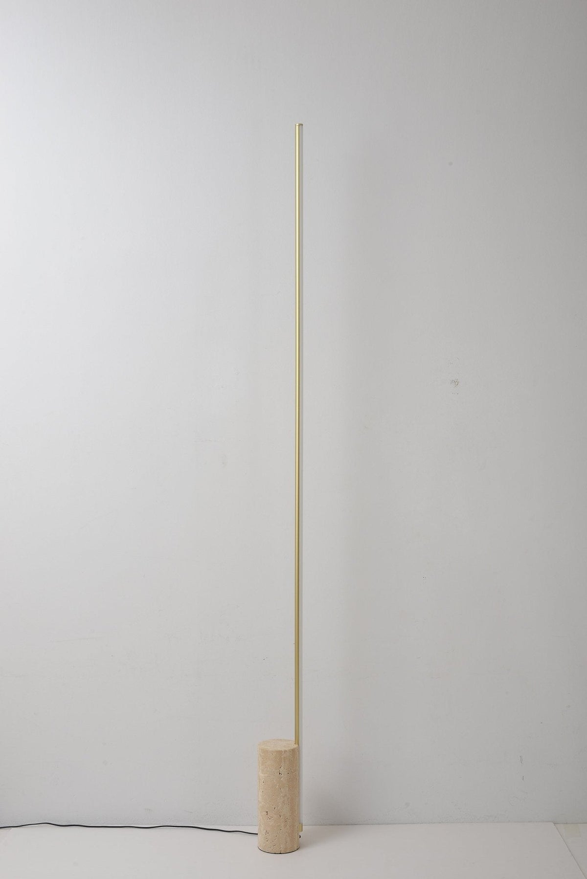 Linear LED Floor Lamp with Travertine Base for Modern Interiors