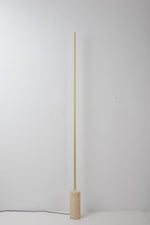 Linear LED Floor Lamp with Travertine Base for Modern Interiors