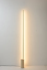 Linear LED Floor Lamp with Travertine Base for Modern Interiors