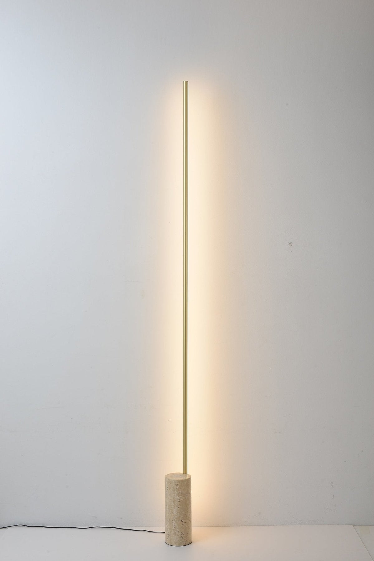 Linear LED Floor Lamp with Travertine Base for Modern Interiors