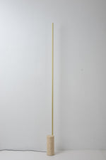 Linear LED Floor Lamp with Travertine Base for Modern Interiors