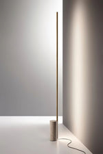 Linear LED Floor Lamp with Travertine Base for Modern Interiors
