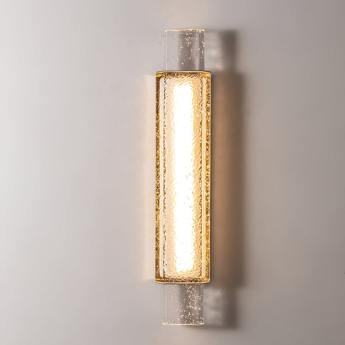 Glimmering Gold Wall Sconce with Textured Glass