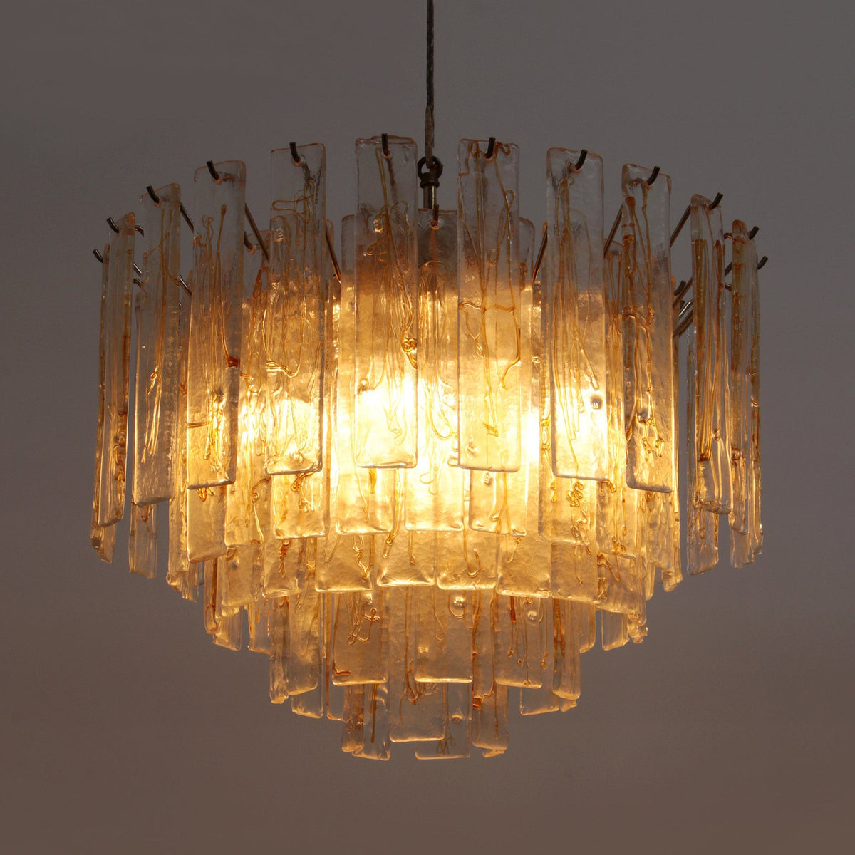 Amber Glass Chandelier with Brass Chain – Modern Luxury Lighting for Dining and Living Spaces