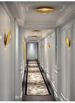 Golden Aura LED Wall Sconce – Modern Brass Finish Architectural Lighting