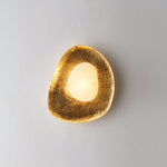 Aurea Alabaster Wall Sconce in Hand-Hammered Brass