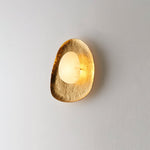 Aurea Alabaster Wall Sconce in Hand-Hammered Brass
