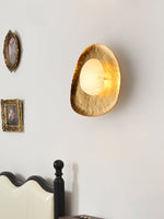 Aurea Alabaster Wall Sconce in Hand-Hammered Brass