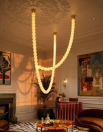 Halti Necklace Acrylic Chandelier with Gold Accents and Integrated LED
