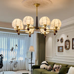 Heritage Bloom Chandelier — Walnut & Brass Pendant Light with Etched Floral Shades