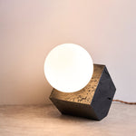 Kryden Sculptural Table Lamp in Black Travertine with Glass Globe