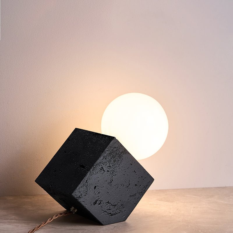 Kryden Sculptural Table Lamp in Black Travertine with Glass Globe