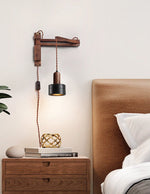 Walnut Swing Arm Wall Sconce with Black Travertine Shade
