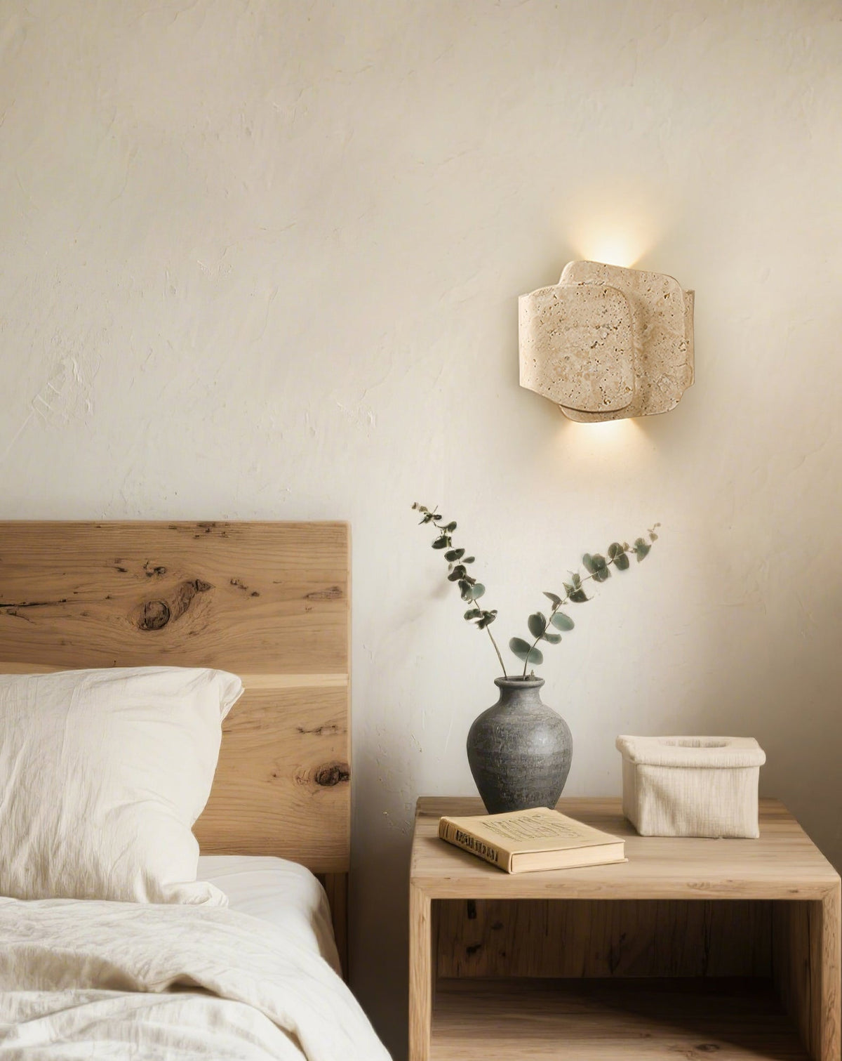 Layered Travertine Wall Sconce with Warm Ambient Glow