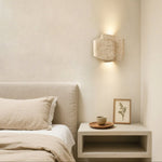 Layered Travertine Wall Sconce with Warm Ambient Glow