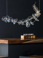 Lily LED Linear Pendant Light – Modern Botanical Glass & Steel Chandelier