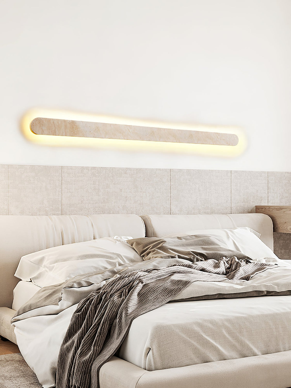 Lior Sculptural Travertine LED Wall Sconce for Modern Interiors