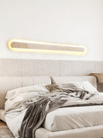 Lior Sculptural Travertine LED Wall Sconce for Modern Interiors