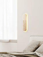 Lior Sculptural Travertine LED Wall Sconce for Modern Interiors