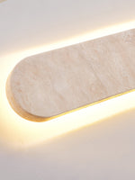 Lior Sculptural Travertine LED Wall Sconce for Modern Interiors