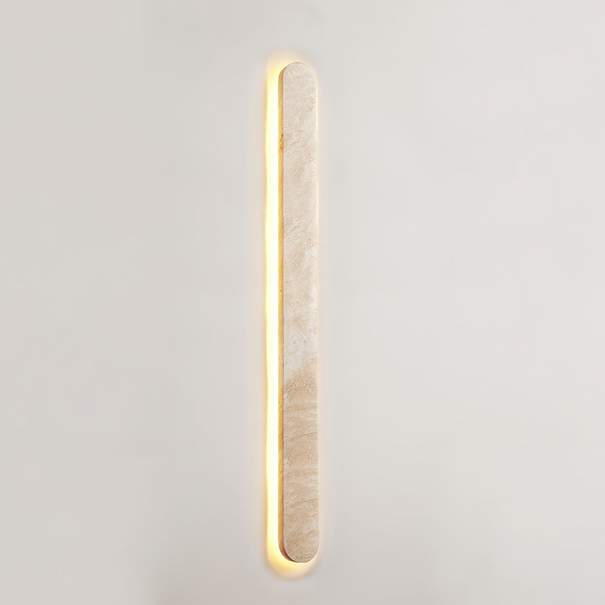 Lior Sculptural Travertine LED Wall Sconce for Modern Interiors