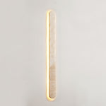 Lior Sculptural Travertine LED Wall Sconce for Modern Interiors