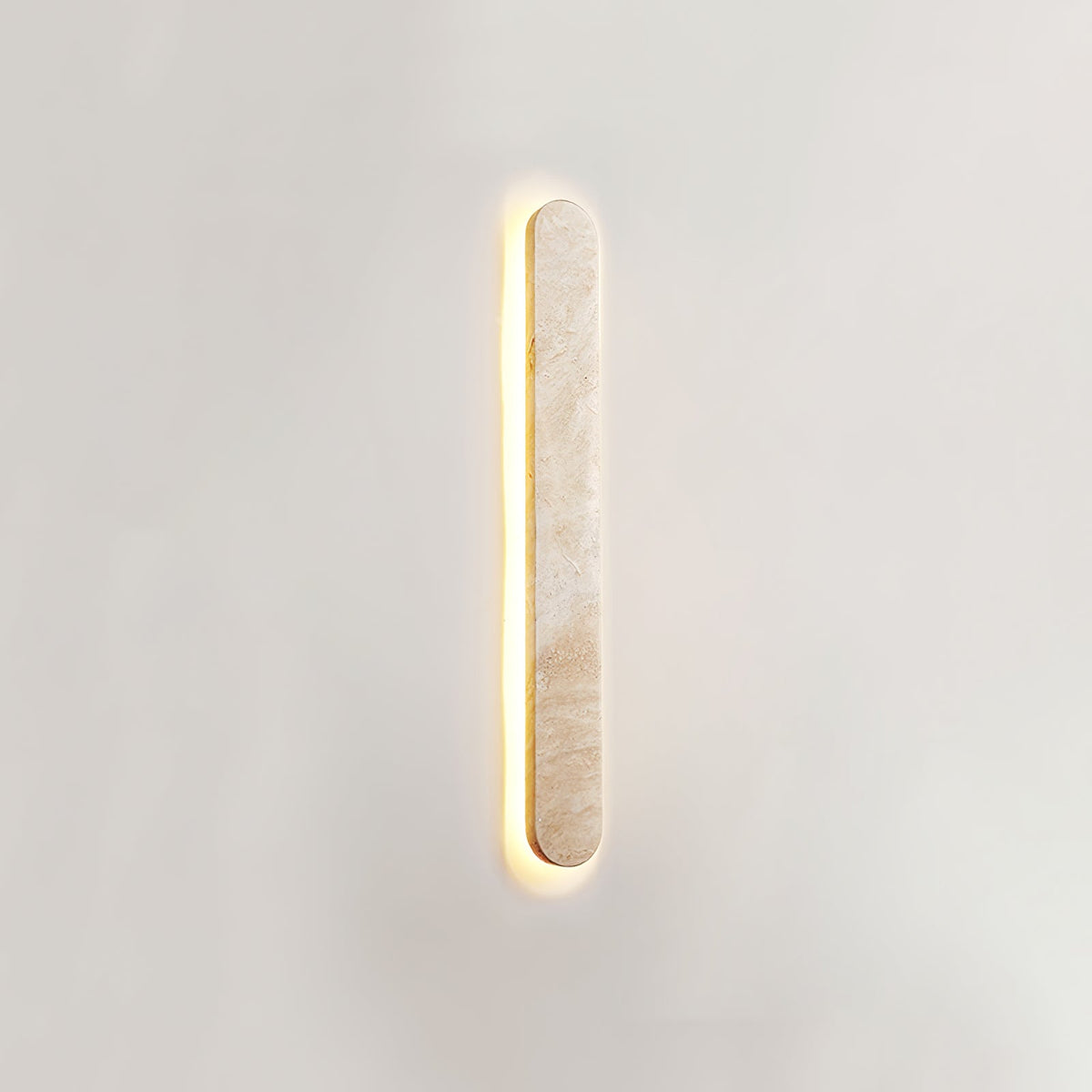 Lior Sculptural Travertine LED Wall Sconce for Modern Interiors