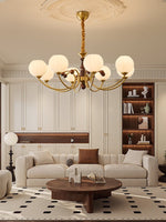 Livia Six-Light Modern Globe Chandelier in Walnut and Gold