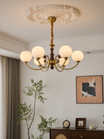 Livia Six-Light Modern Globe Chandelier in Walnut and Gold