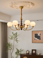 Livia Six-Light Modern Globe Chandelier in Walnut and Gold