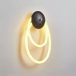 Loop Wall Sconce in Natural Travertine with Braided LED Light