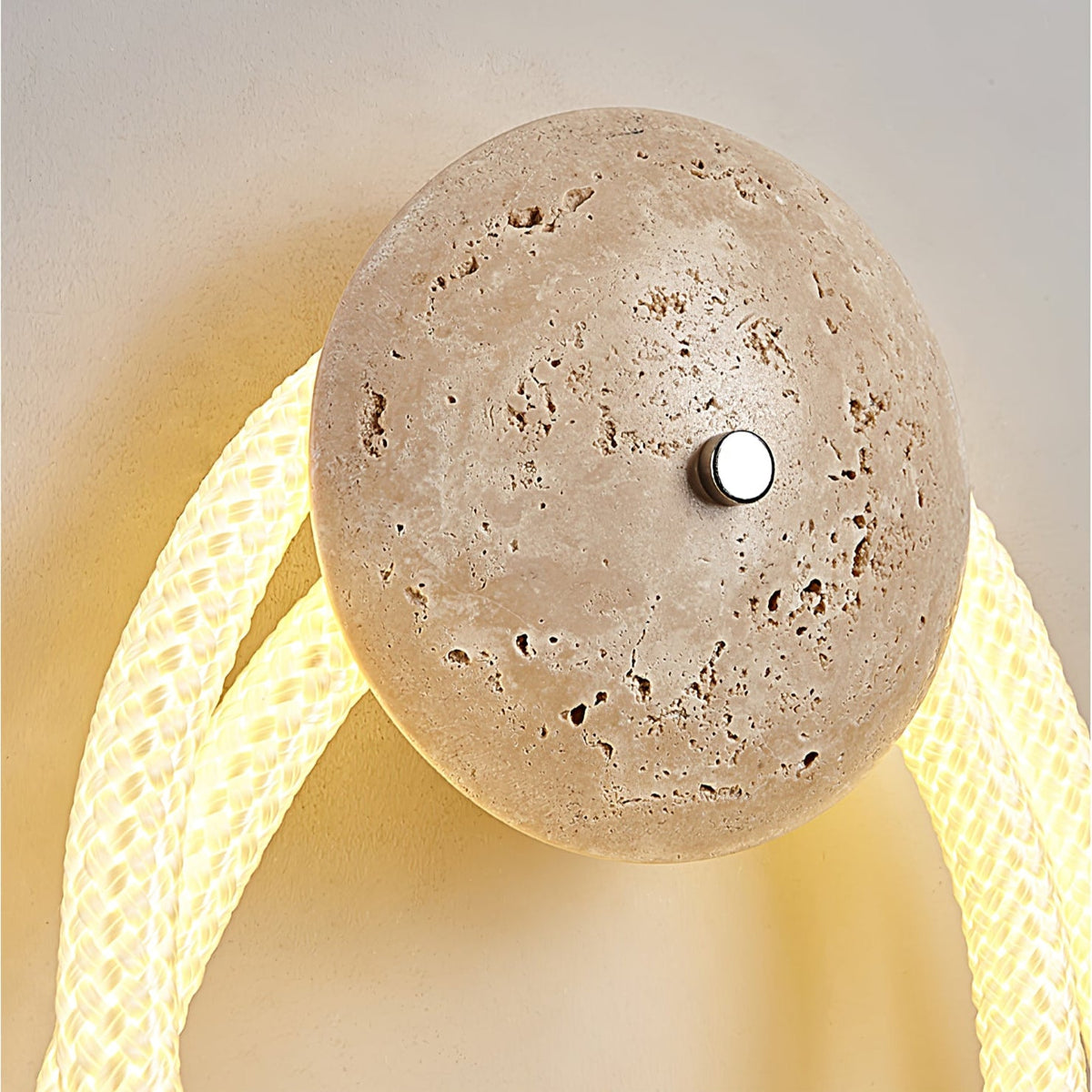 Loop Wall Sconce in Natural Travertine with Braided LED Light