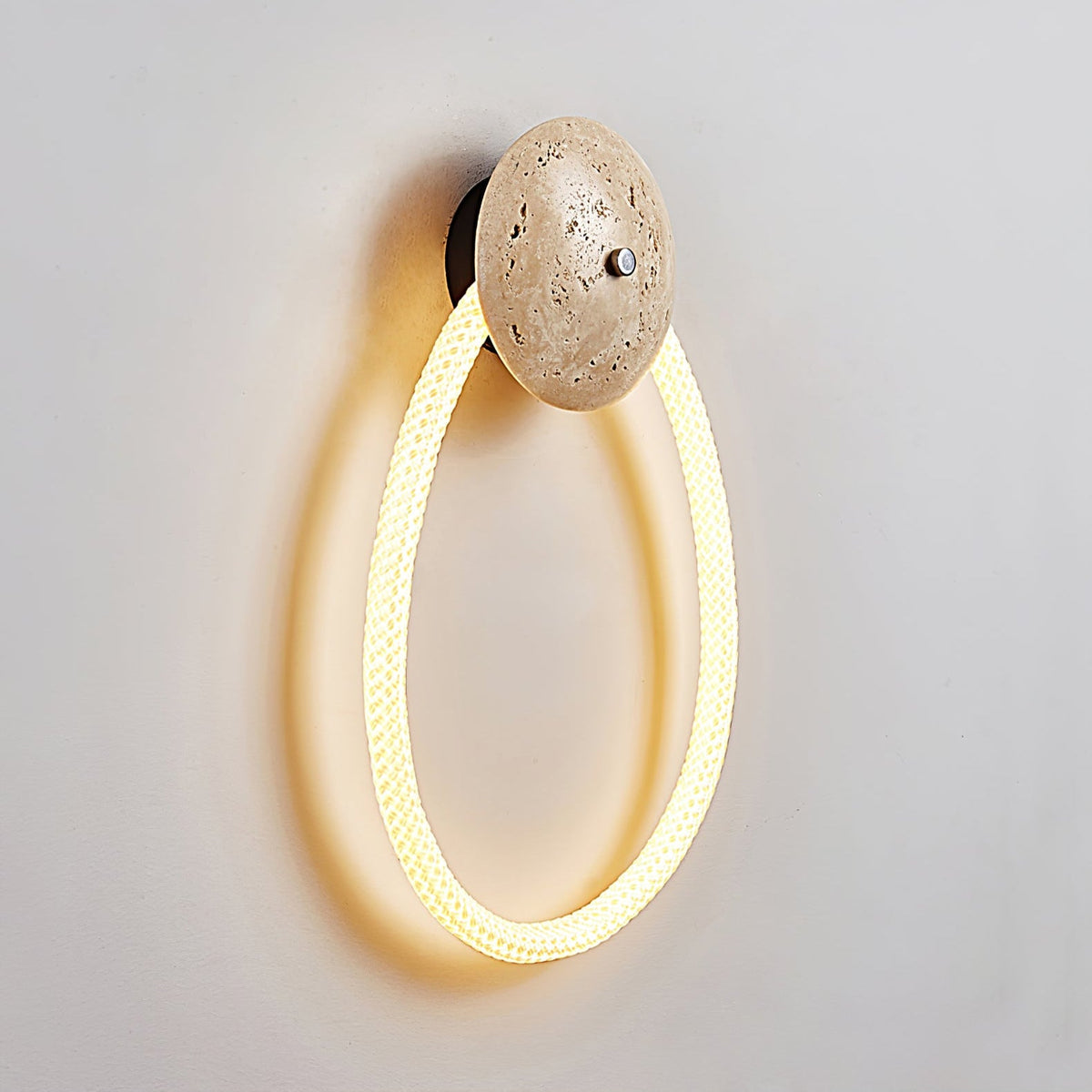 Loop Wall Sconce in Natural Travertine with Braided LED Light