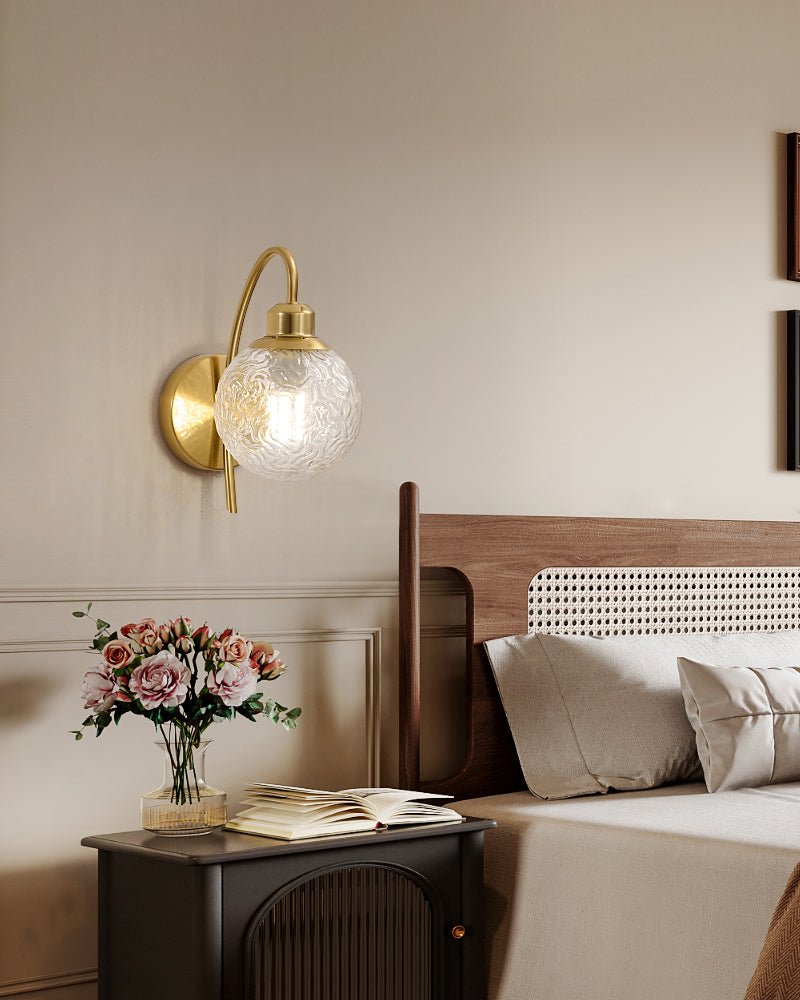 Lucienne Curved Wall Sconce in Gold with Clear Glass Globe