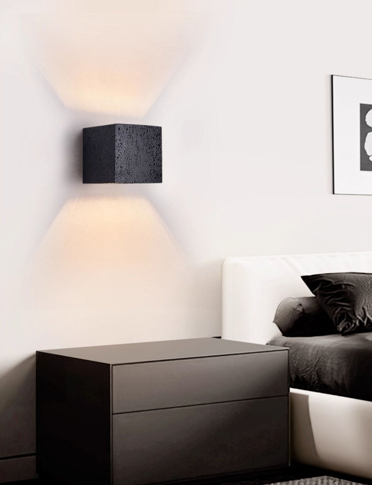 Lumina Void Sconce — Black Travertine Wall Light with Warm Glow